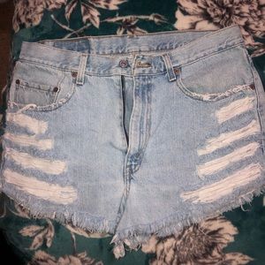 Light blue Levi’s distressed shorts